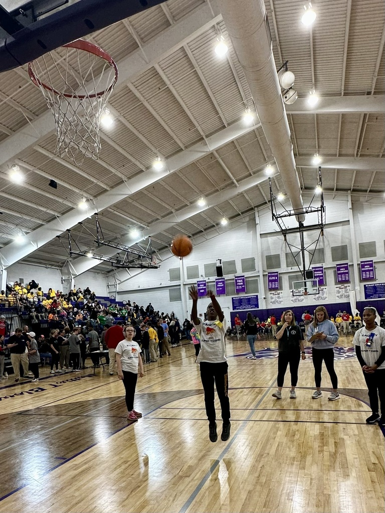 Student shooting a basketball