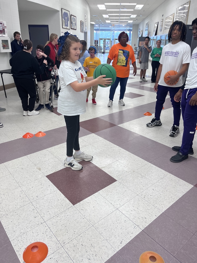 Student holding a basketball