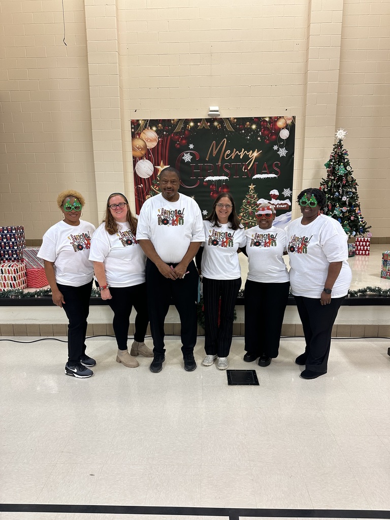 Group staff picture in Holiday Shirt 