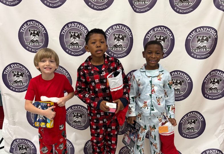 Students with their christmas gifts and stockings