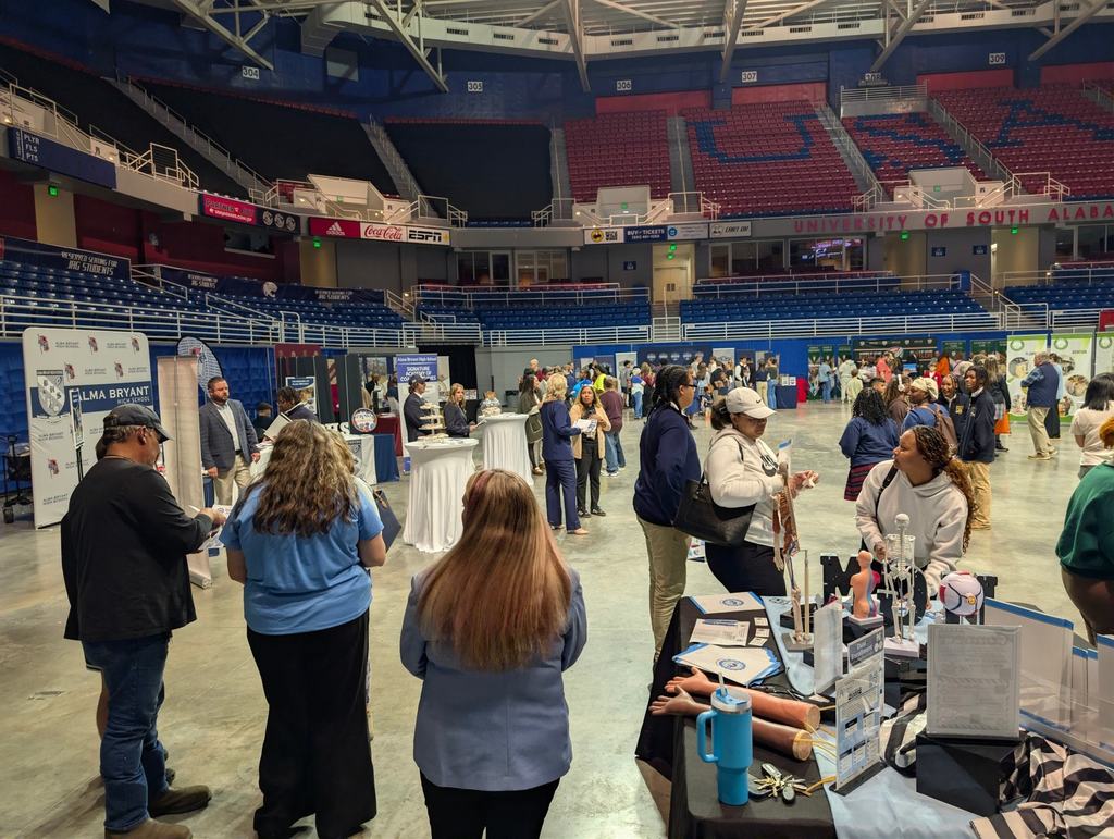 MGM faculty members interacting with parents and students