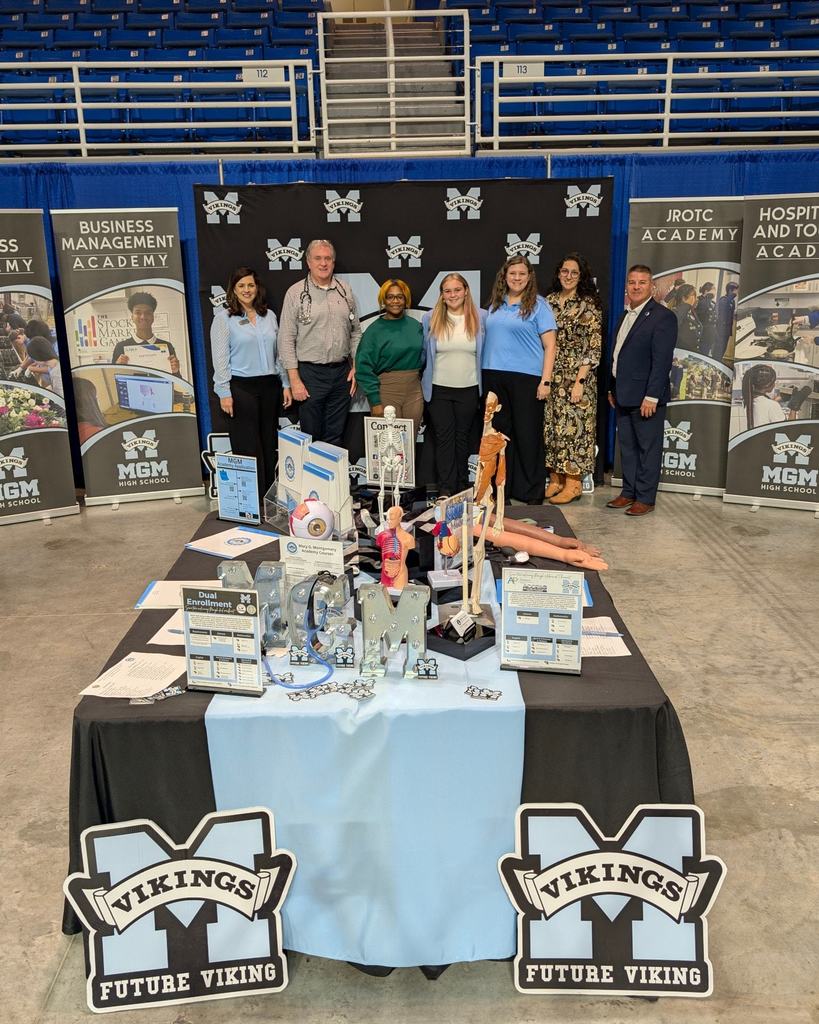 MGM Showcase booth and faculty members.