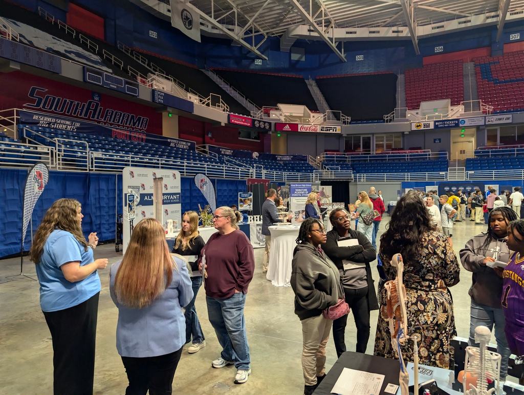 MGM faculty members interacting with parents and students