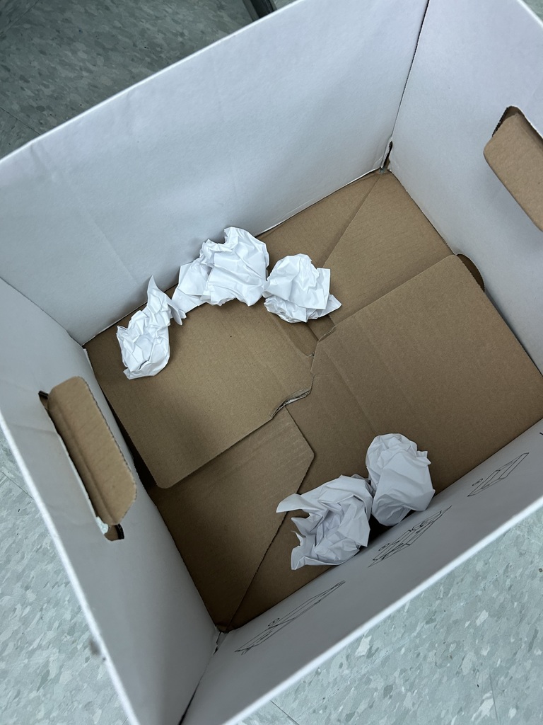 Paper balls in a box