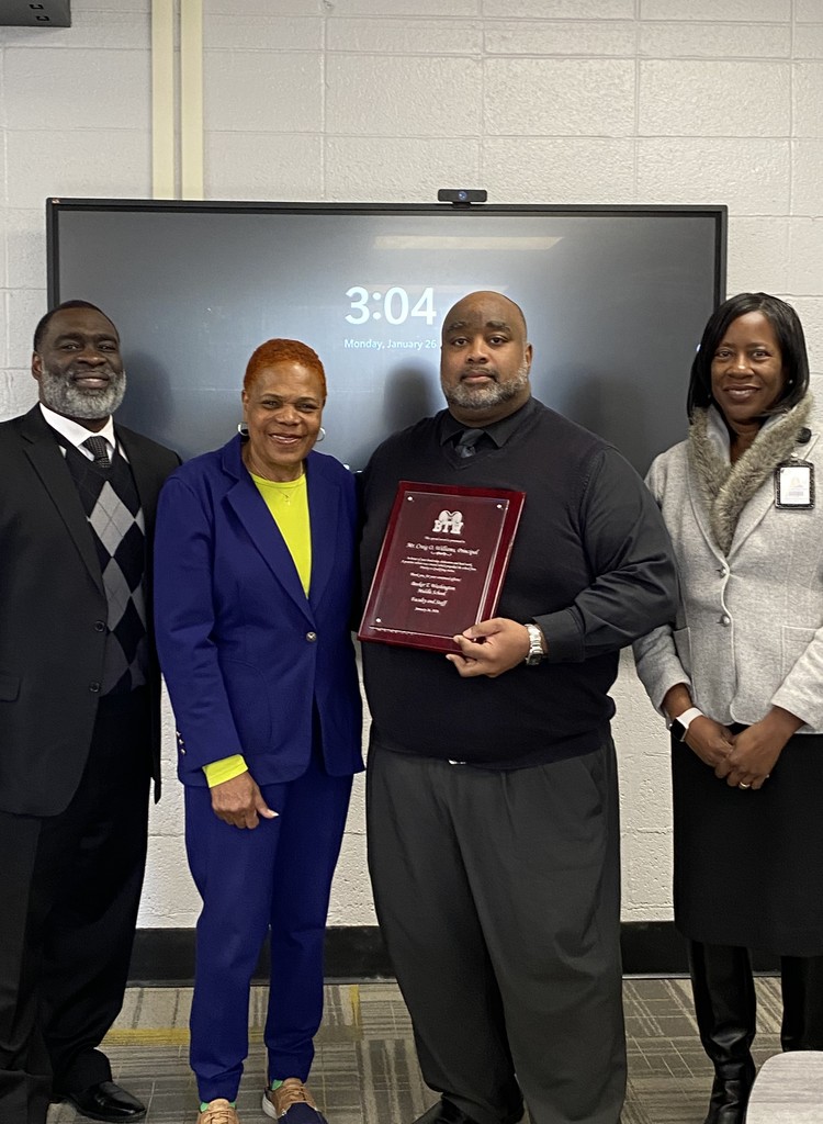 Mr. Williams Award Day picture with Dillahay, Dennis, and Jones in BTW library