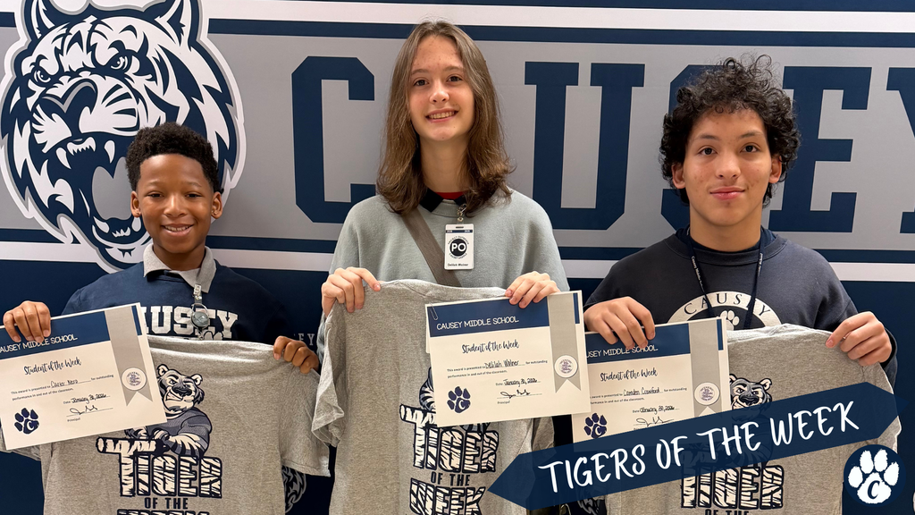 Students holding t-shirts and certificates, Tigers of the week, 1-30