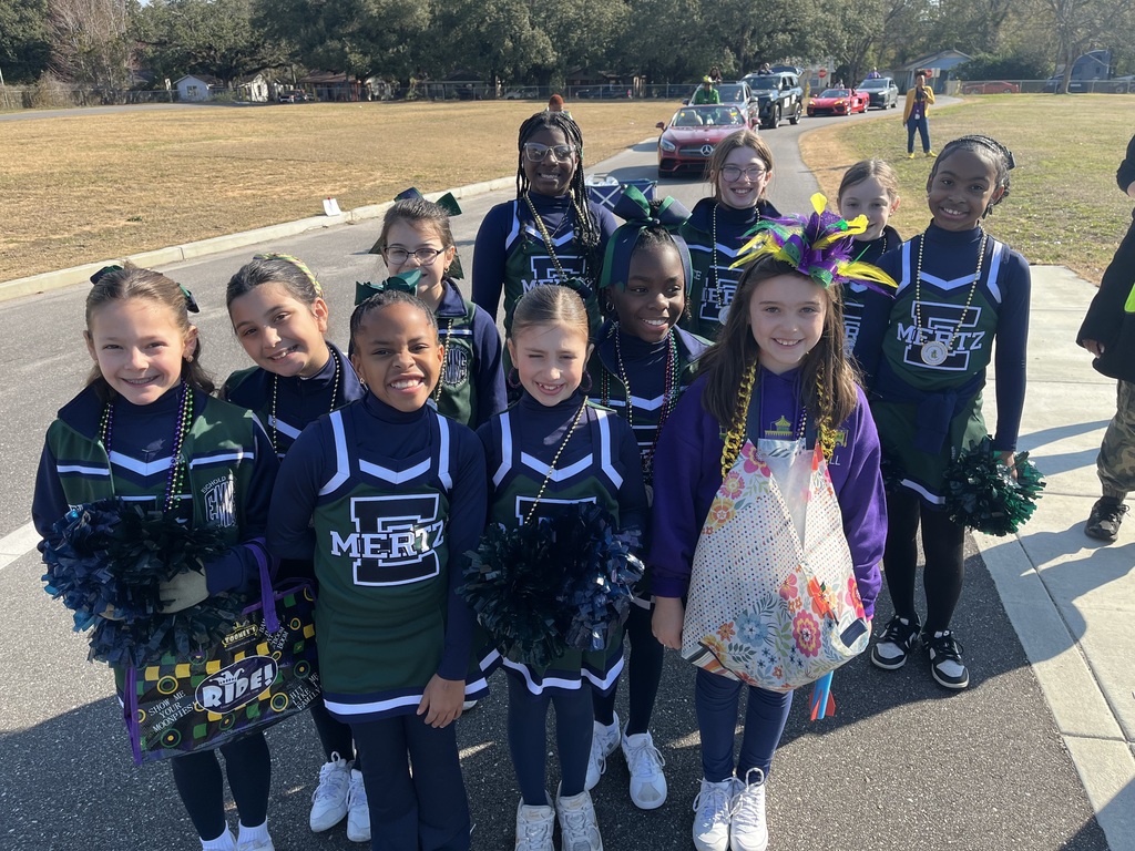 Cheerleaders at the front of a parade