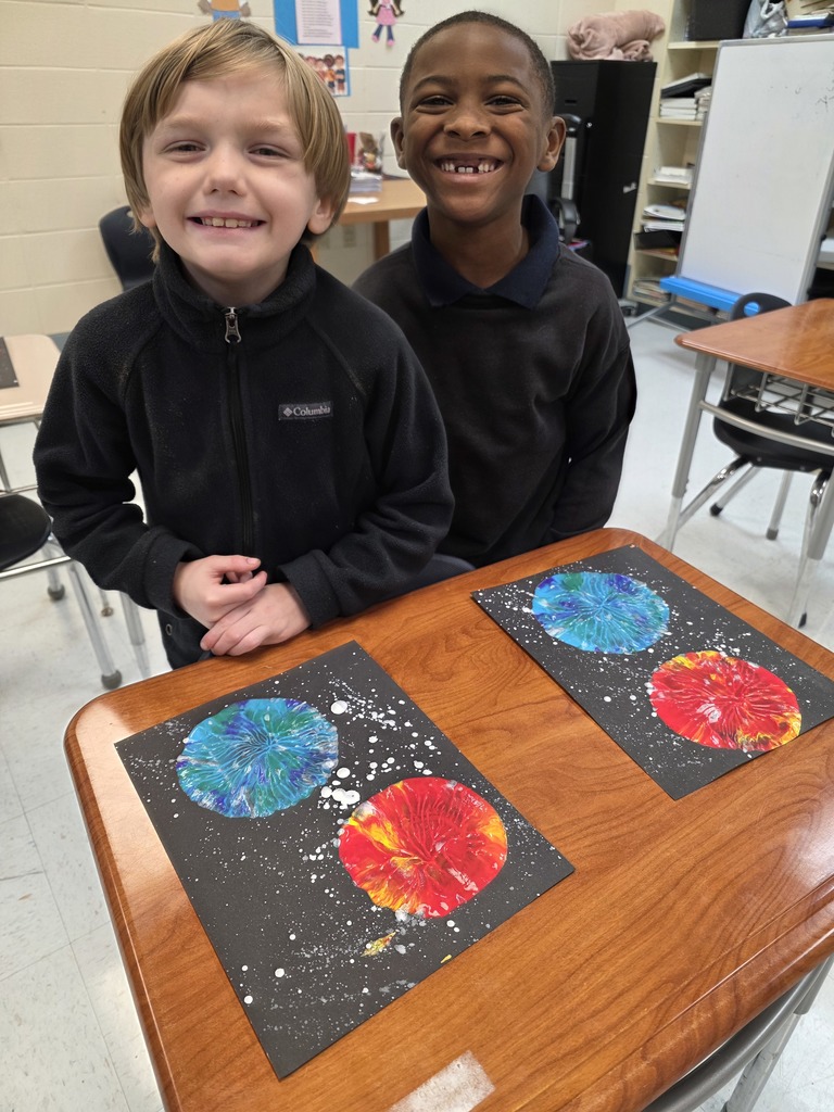 Students with their art projects 