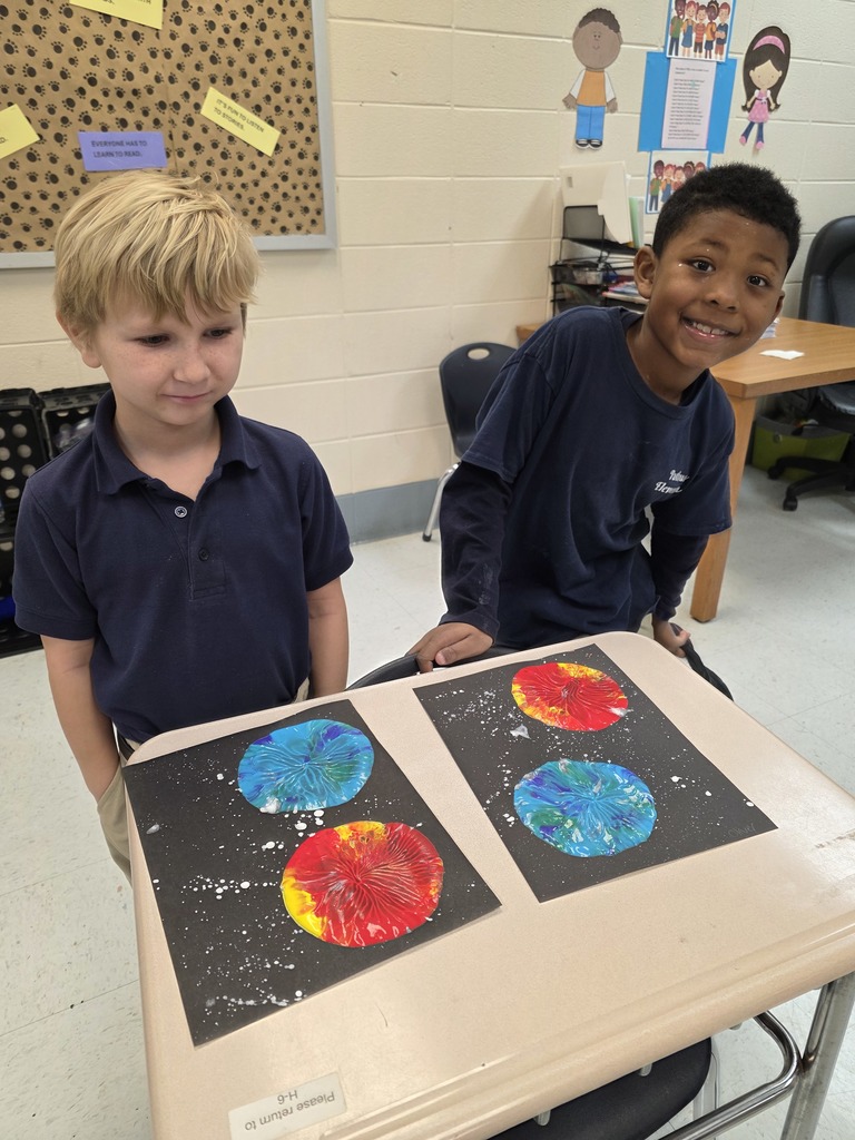 Students with their art projects 