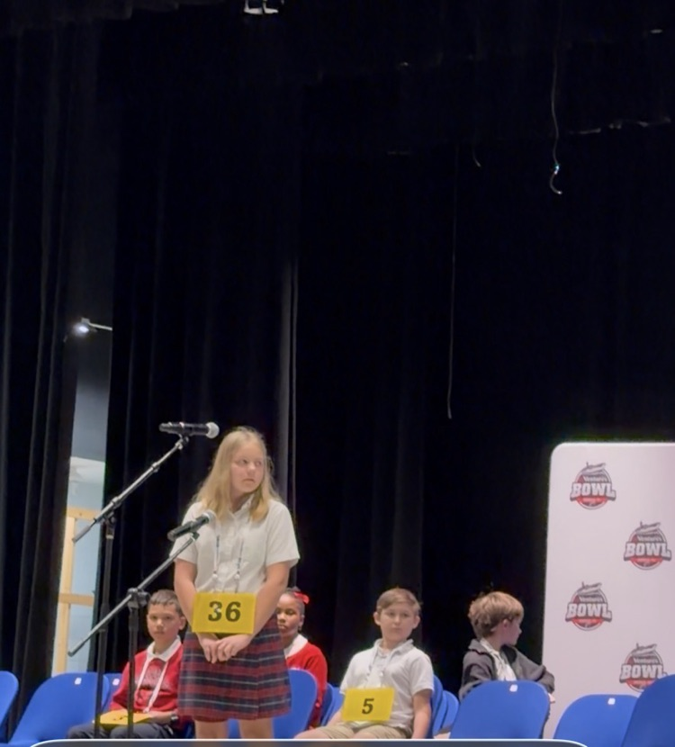 Photos of Piper Turner participating in the Mobile County Spelling Bee 