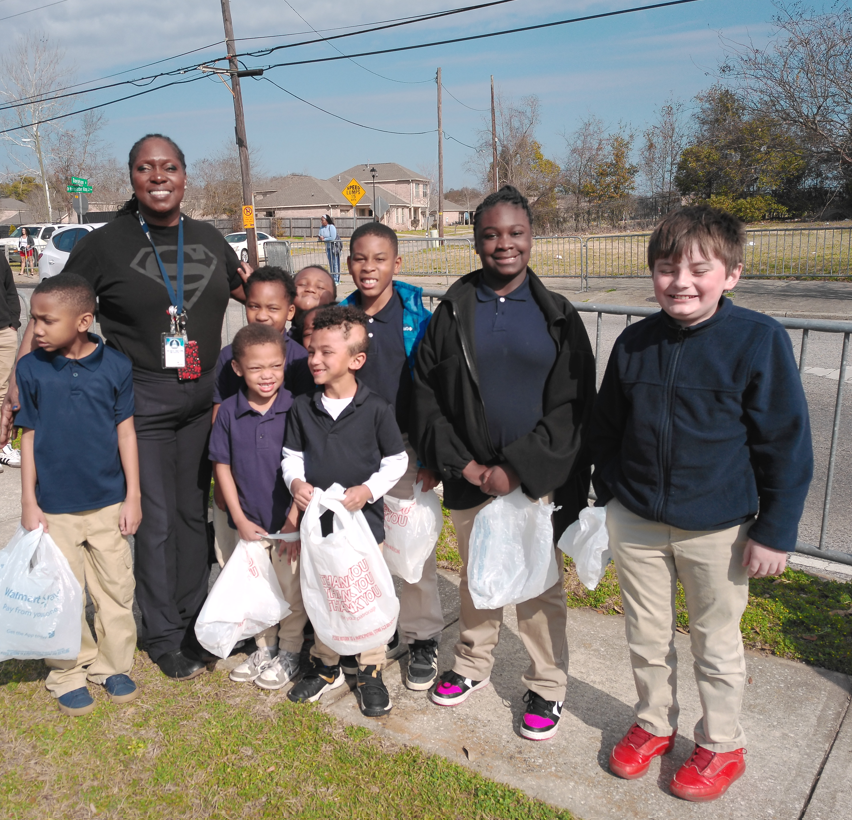 Ms. Floyd and several students at the parade 