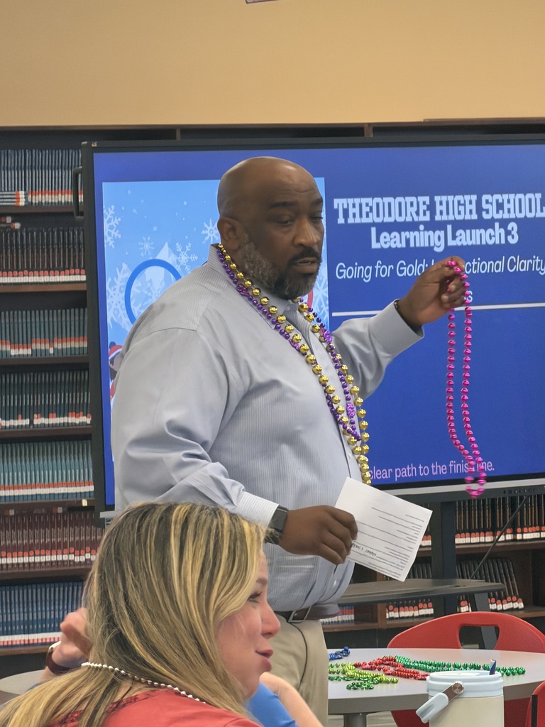 Mr. Godwin describes the bead competition. 