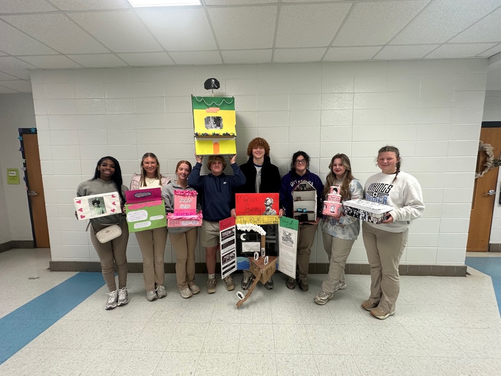 Dual Enrollment U.S. History students displaying their completed research projects with a creative twist!