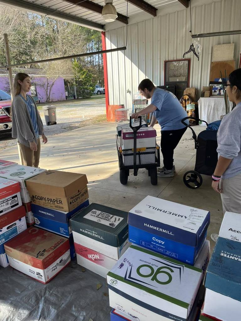 FBLA students volunteering at the Mobile SPCA