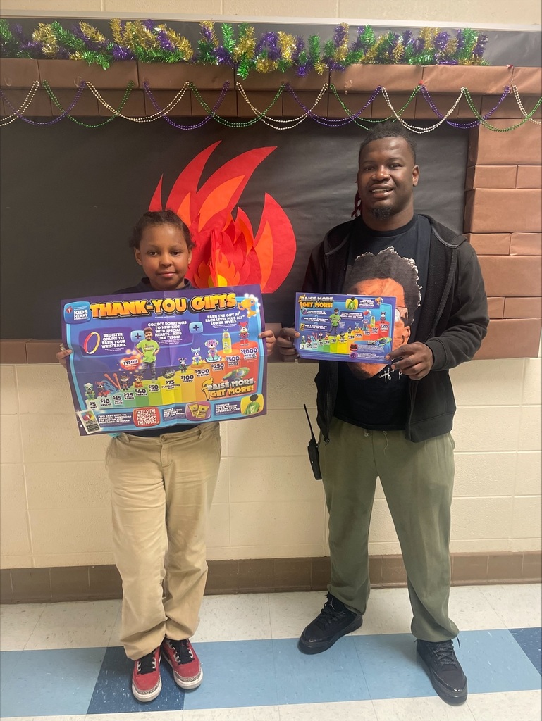 Coach Harper and a student holding up an American heart association flyer to help raise awareness to the Kids heart Challenge 