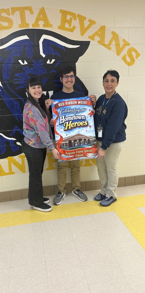 Justin and Mrs. Kidd and school counselor 