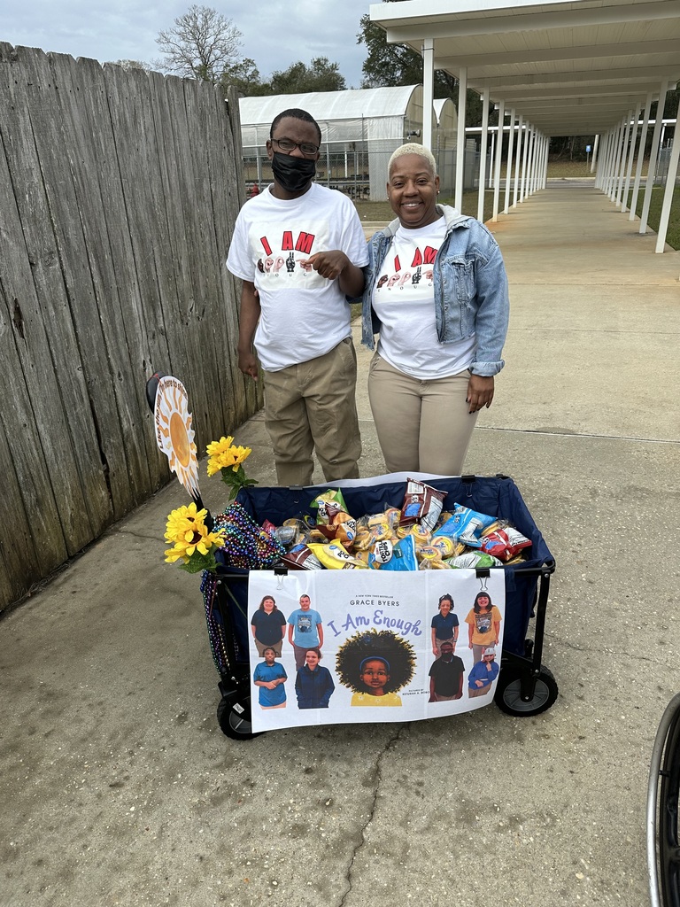 Mrs. Gray with student 