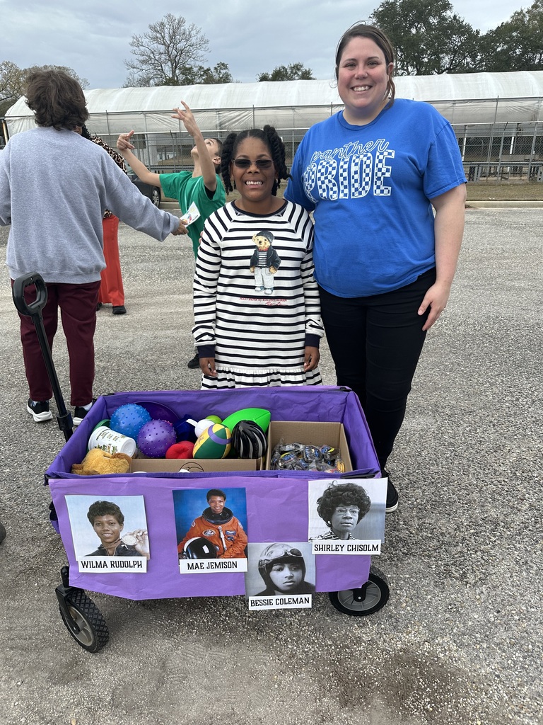 Mrs. Tolley with student 