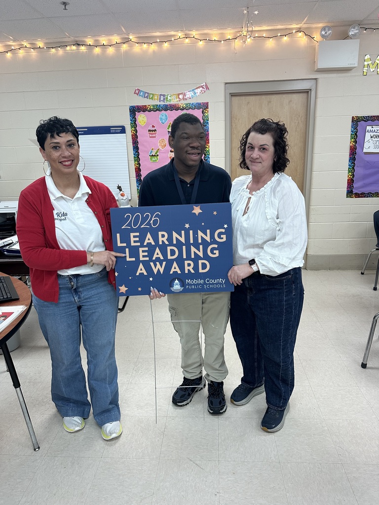 Sedrick, Mrs. Kidd, and his teacher 