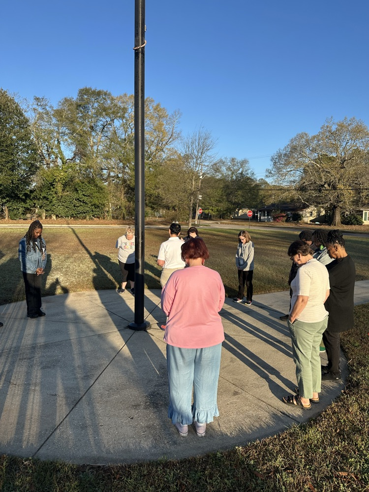 Mrs Kidd at the flagpole 