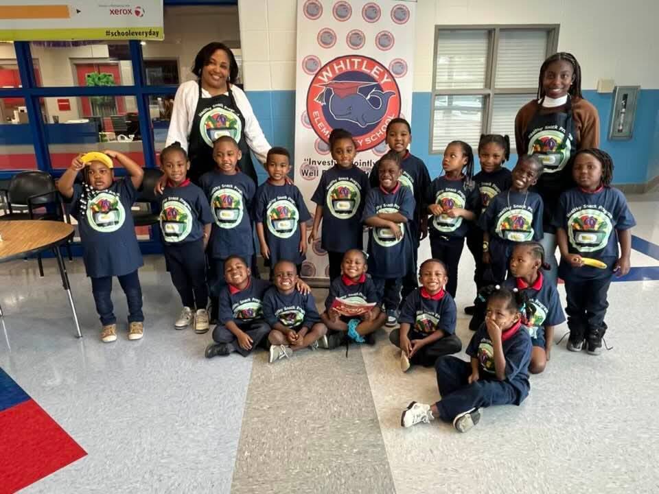 A group of students with two adults