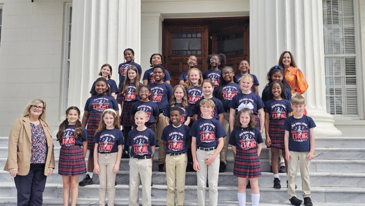 Dr. Byrd and Mrs. Corley with the choir in Montgomery  