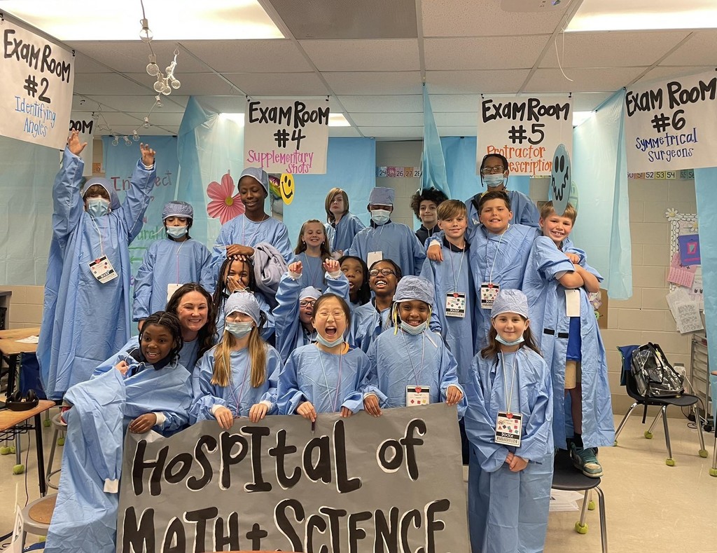 A group of Dawes Intermediate students dressed in hospital scrubs