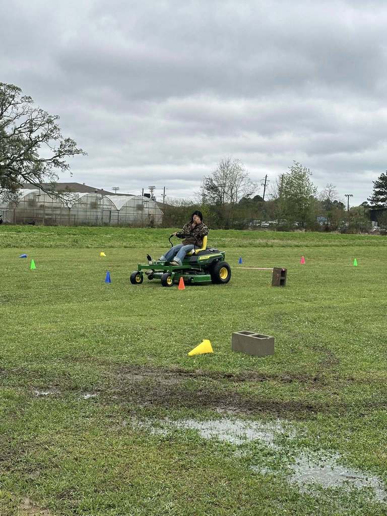 Our Semmes FFA members  competing in the County Zero-Turn Driving Contest.