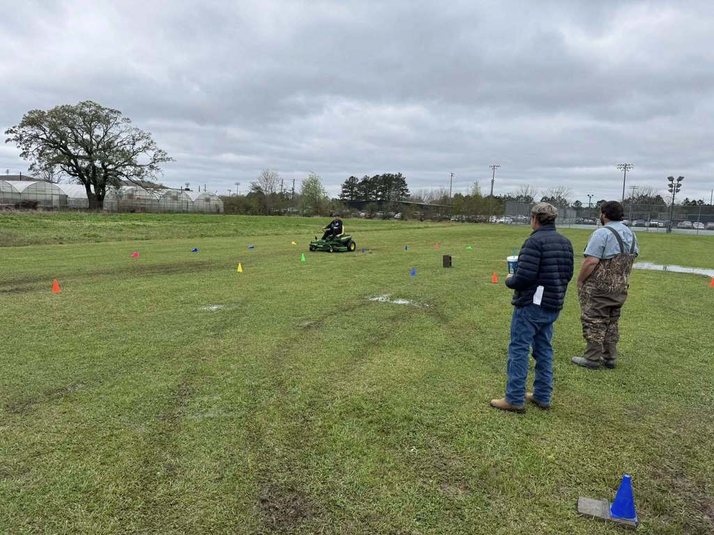 Our Semmes FFA members  competing in the County Zero-Turn Driving Contest.
