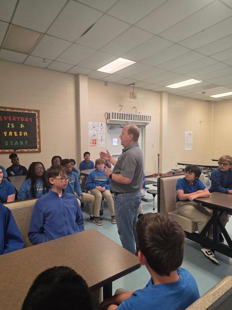 Dr. Agnew visits 6th graders at Hankins Middle School.