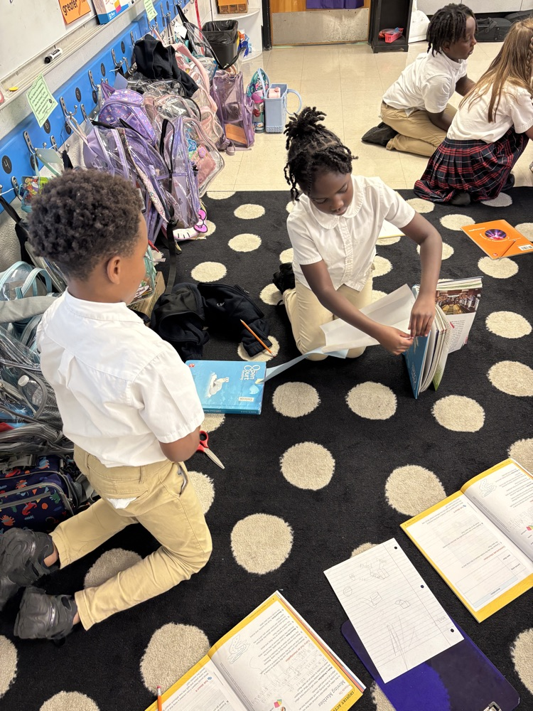 third graders doing a science experiment 