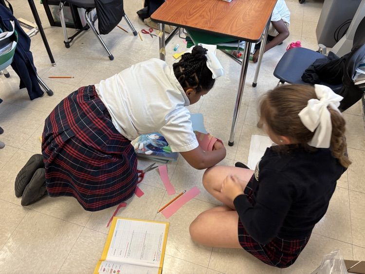 third graders doing a science experiment