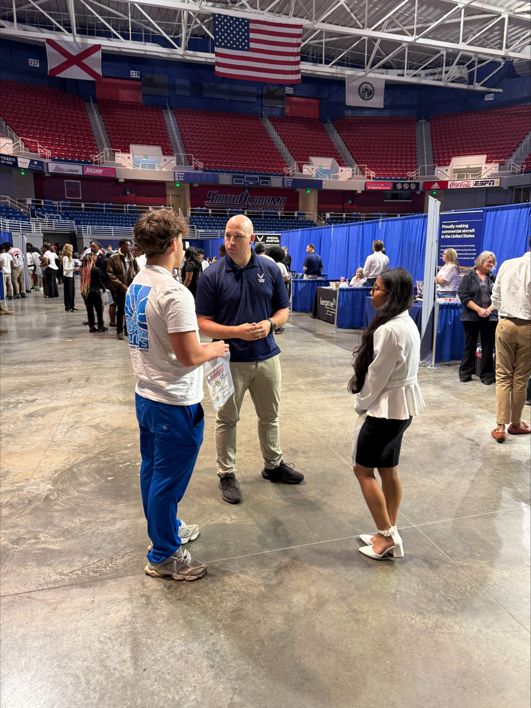 These students speak with a representative from the Air Force. 