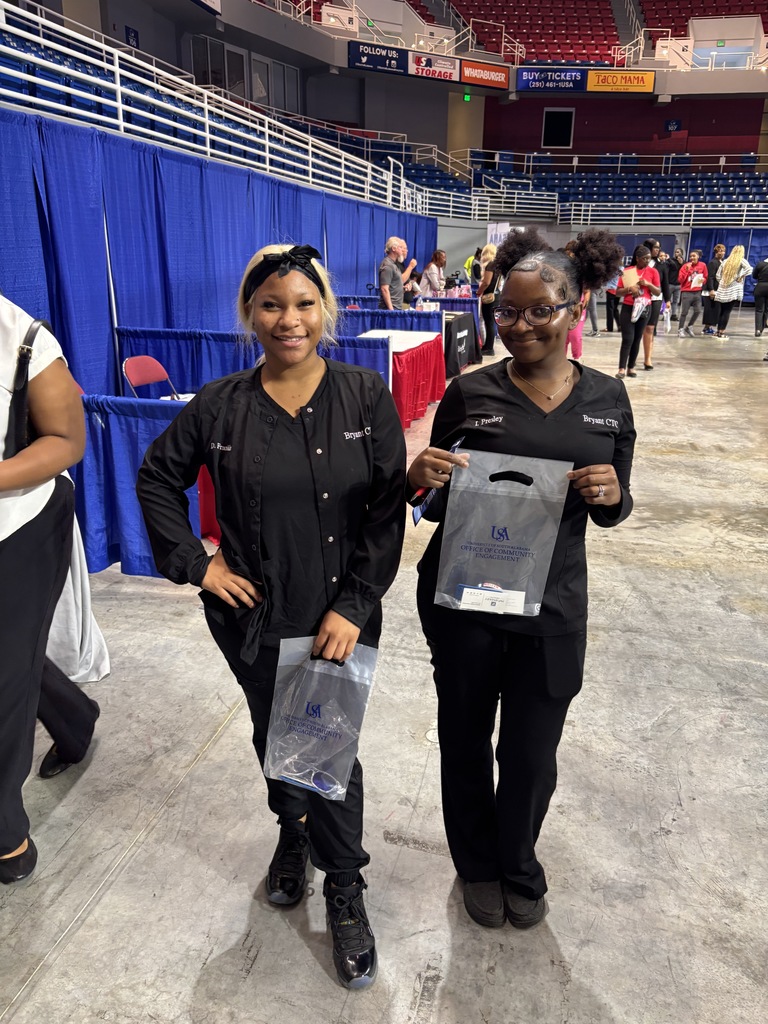 These young ladies show off the swag they got from the University of South Alabama!