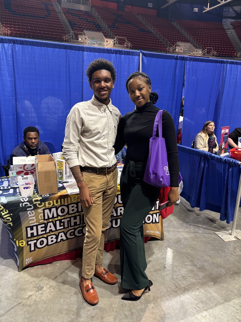 These students take a pause to pose after speaking with a representative of the Mobile Health Department. 
