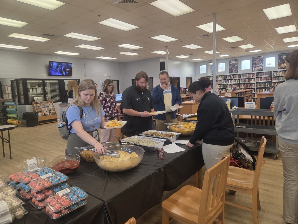 teachers enjoying various dips and chips