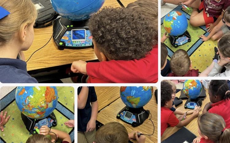 Mrs Qualls class enjoying their new globes.