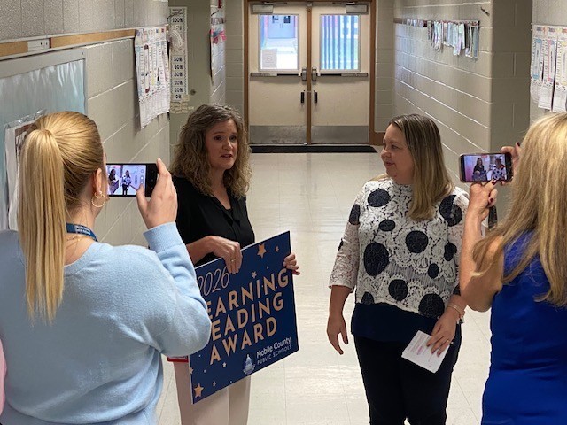 McDavid-Jones Principal Kristy Davis being interviewed