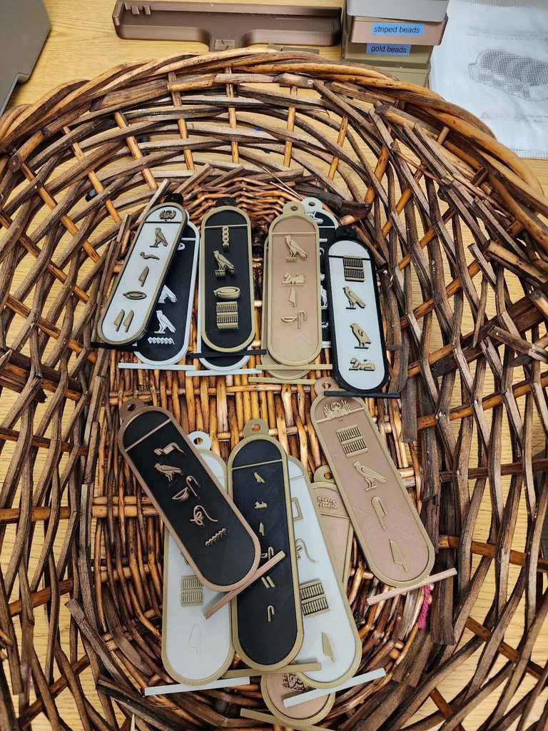 A basket full of cartouches made by students