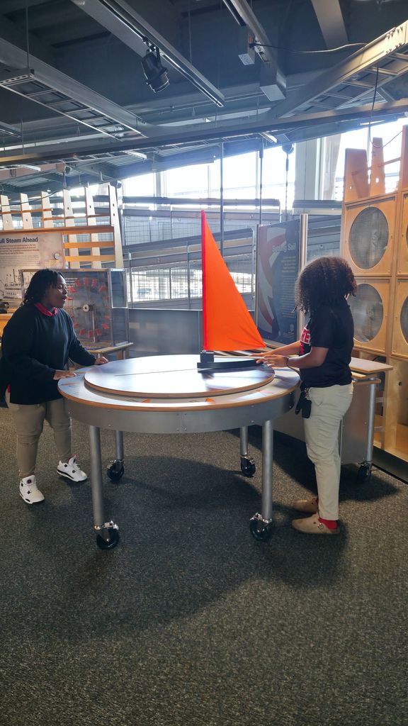 Students viewing an exhibit at the Maritime Museum.
