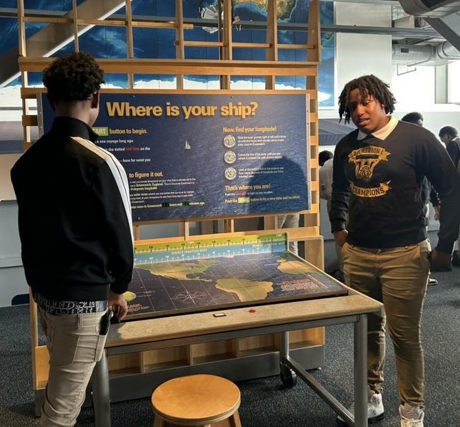 Two Williamson students looking at an exhibit