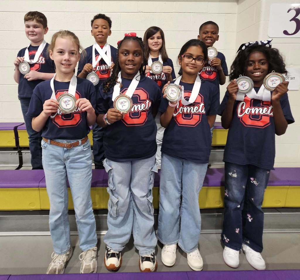 A group of Council students holding up their medals