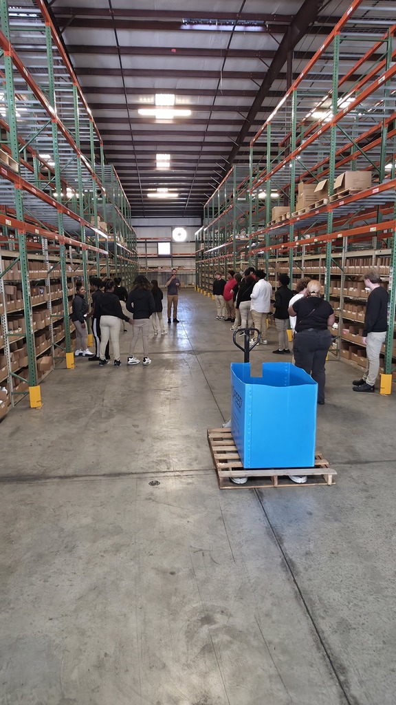 Learning about warehousing on the Educators Resource field trip.