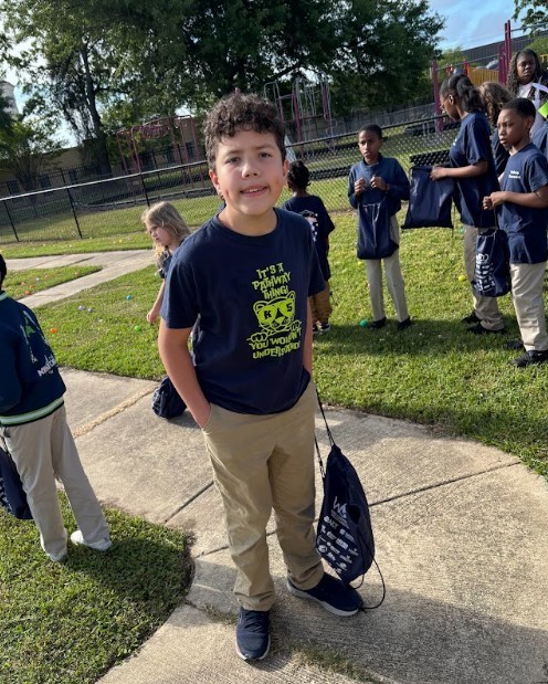 Students posing at the easter eggs hunt
