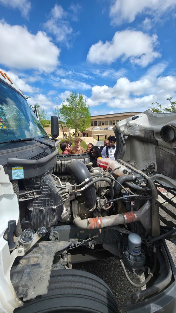 Taking a peek under the hood of the Legacy Cartage truck.