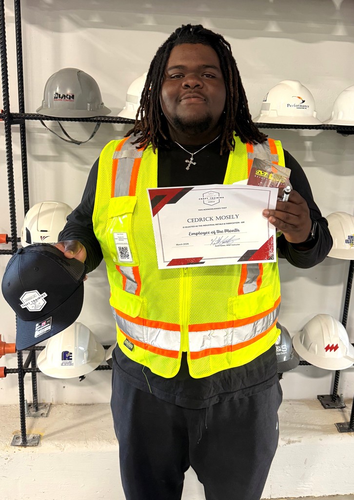Cedric Mosely's employee of the month picture with his certificate.