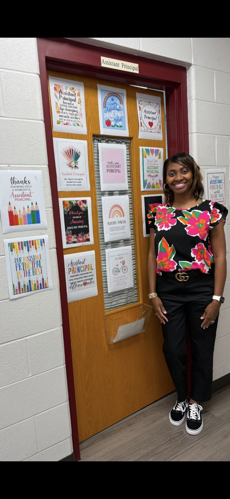 Dr. Charles by her thank you signs