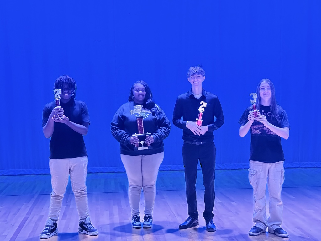 All of the winners with their trophies. 
