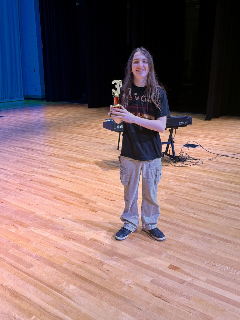Wolfe with his third place trophy.