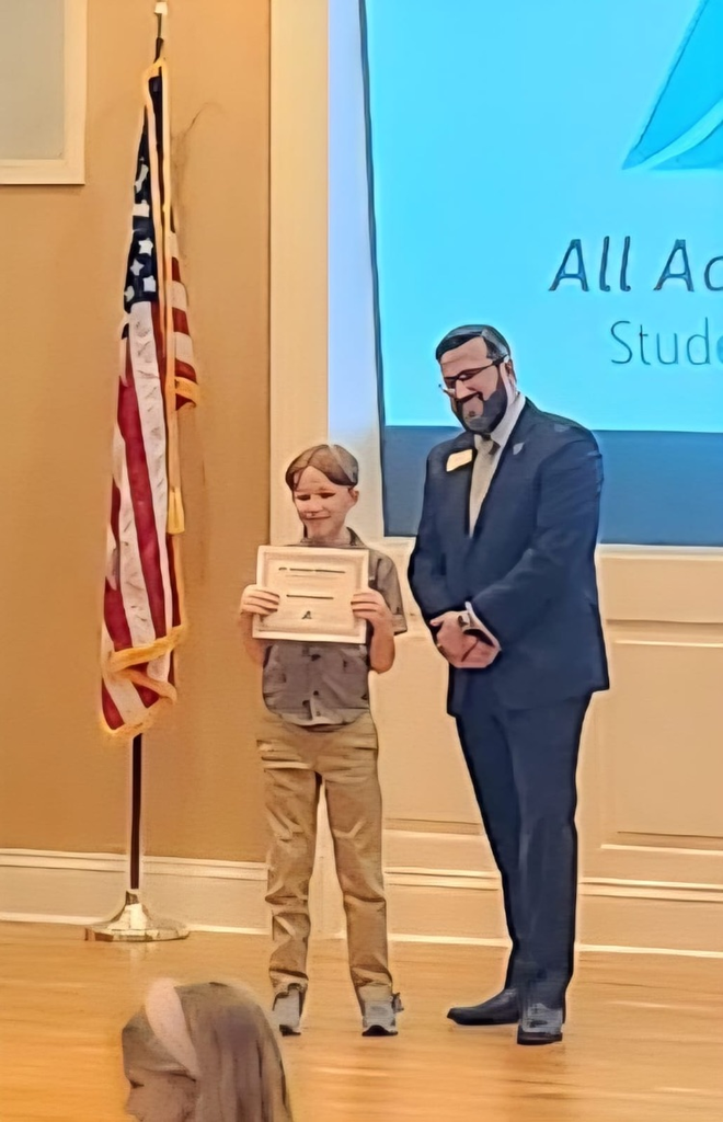 Ruston getting his achievement award